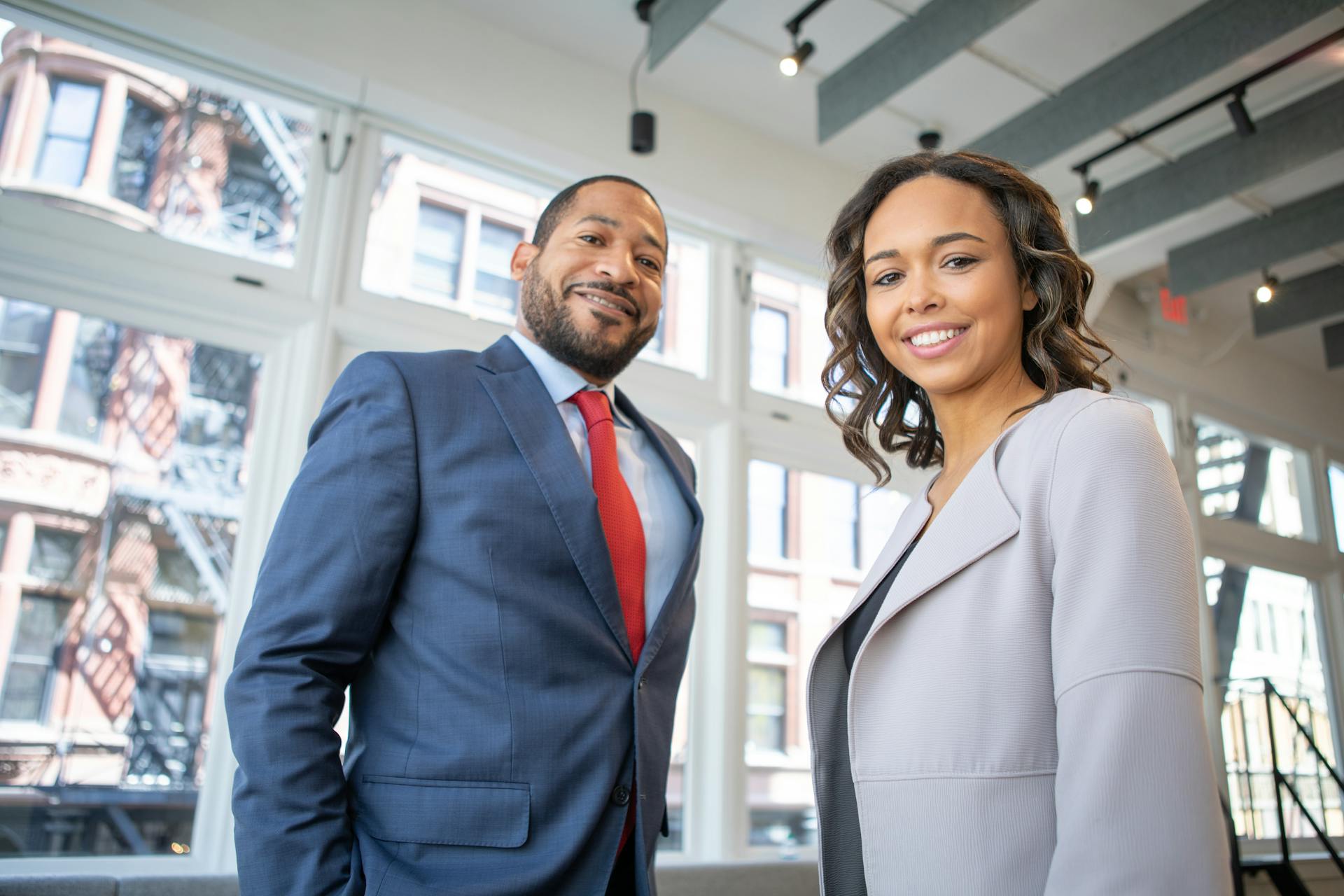 black man and woman in office